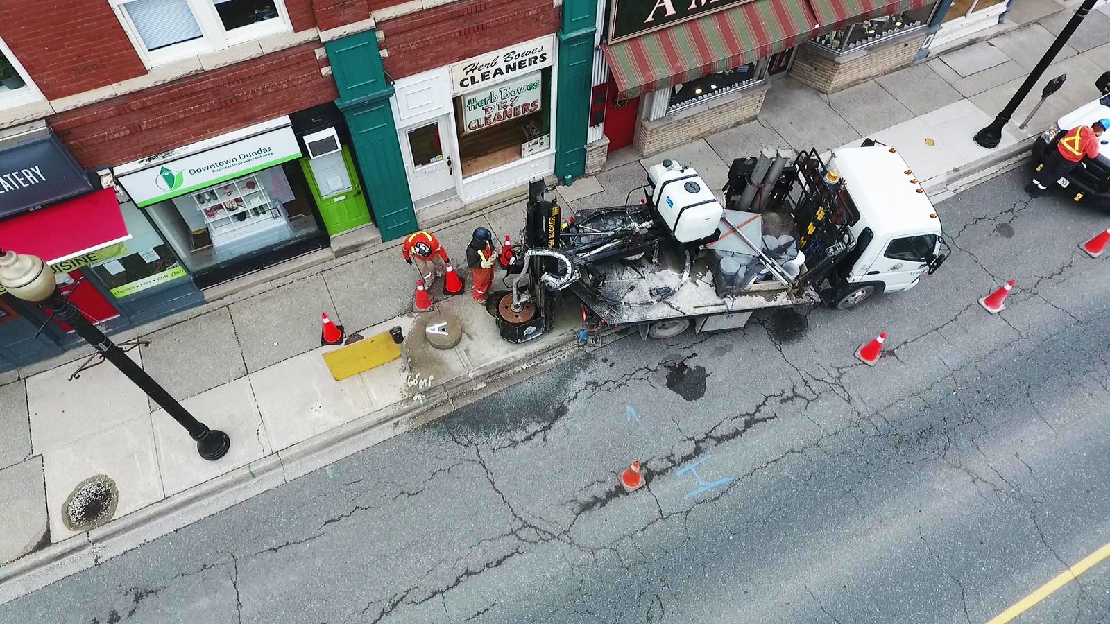 Hydrovac truck staged beside a utility excavation